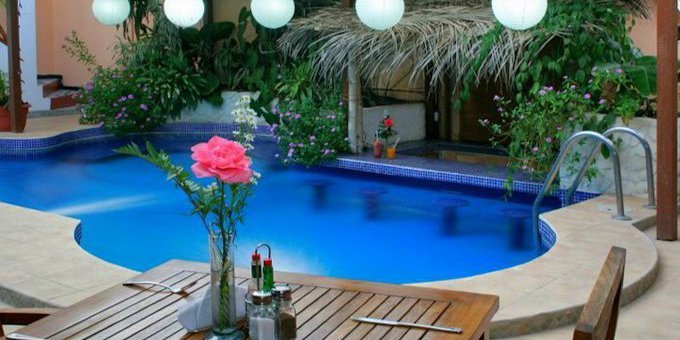 Hotel Poseidon is a boutique style hotel located a half block from the beach at Playa Jaco.  Hotel amenities include swimming pool, restaurant, bar, and internet.
