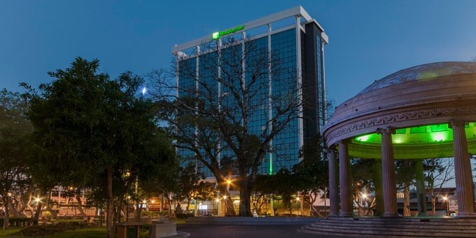 Holiday Inn San Jose Aurola in San Jose, Costa Rica, is a modern and sophisticated hotel that offers a comfortable and convenient stay in the heart of the city. Located just steps away from the bustling downtown area, this hotel is an ideal choice for both business and leisure travelers. The well-appointed rooms and suites feature contemporary designs and amenities, ensuring a restful and enjoyable stay. Guests can savor a variety of culinary delights at the on-site restaurants, which serve a range of international and local cuisines. The hotel's pool provides a refreshing oasis, while the fitness center allows guests to stay active during their stay. With its central location, guests have easy access to the city's attractions, including museums, shops, and entertainment venues. The attentive and friendly staff are dedicated to providing excellent service and ensuring that every guest's needs are met. Whether visiting for business or leisure, Holiday Inn San Jose Aurola offers a comfortable and convenient retreat in San Jose, Costa Rica. Hotel amenities include business center, internet, fitness center, spa facilities, indoor heated swimming pool, two restaurants and a bar.