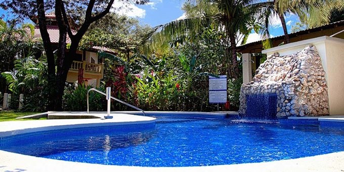 Harbor Reef Lodge is an eco-hotel located in Nosara, three minutes from Playa Guiones.  Hotel amenities include  swimming pools, WiFi, and a rustic jungle setting.