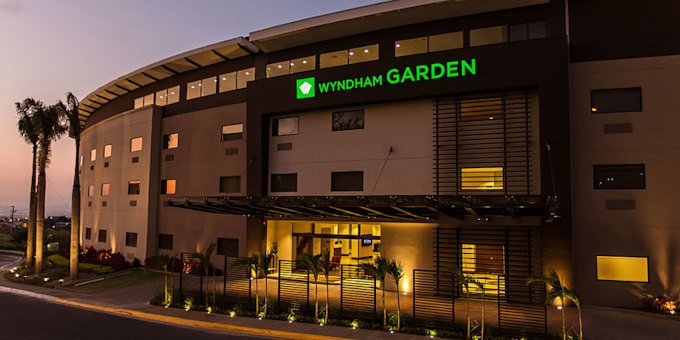 Hotel Wyndham Garden Escazú is a contemporary hotel located in the vibrant city of Escazú, Costa Rica. The hotel offers modern and spacious accommodations, with comfortable rooms and suites that are tastefully decorated and equipped with all the necessary amenities for a pleasant stay. Guests can enjoy a range of on-site facilities, including a fitness center, outdoor pool, and a business center. The hotel's restaurant serves delicious local and international cuisine, and there is also a bar where guests can relax and unwind. The convenient location of the hotel provides easy access to nearby attractions, shopping centers, and restaurants, making it an ideal choice for both business and leisure travelers. The friendly and attentive staff ensure that guests have a comfortable and enjoyable experience during their stay at Hotel Wyndham Garden Escazú. Hotel amenities include a restaurant, bar, swimming pools, jacuzzi, fitness center, mini-mart, concierge service, and internet.