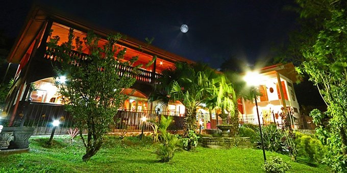 Hotel Fonda Vela is a charming and cozy hotel nestled in the picturesque cloud forests of Monteverde, Costa Rica. This family-owned boutique hotel offers a warm and welcoming atmosphere, combined with comfortable accommodations and friendly service. The rooms and suites are tastefully decorated, featuring wooden furnishings to create a peaceful ambiance. Guests can enjoy panoramic views of the cloud forest from their balconies or relax in the hotel's lush gardens. The on-site restaurant serves delicious local and international cuisine, showcasing fresh and organic ingredients. The hotel also features a heated indoor pool and a spa, where guests can indulge in rejuvenating treatments. With its tranquil setting and proximity to nature reserves and adventure activities, Hotel Fonda Vela provides the perfect base for exploring the unique biodiversity and natural wonders of Monteverde. Whether seeking relaxation, adventure, or a blend of both, Hotel Fonda Vela offers a memorable and enchanting experience in the heart of the cloud forest. Hotel amenities include a restaurant and bar, heated swimming pool and Jacuzzi, tropical gardens, trails, and WiFi in some public areas.