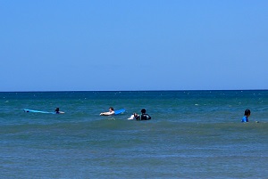 Friends having fun in paradise, surfing in Costa Ricas South Pacific