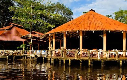 Immersed in the jungle and tropical gardens, Laguna Lodge, sits on a narrow strip of land between the Caribbean Sea and Tortuguero Canals.