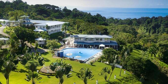 Hotel Cristal Ballena is a beautiful hilltop retreat located in Uvita, Costa Rica. Set amidst tropical gardens and overlooking the Pacific Ocean, this eco-friendly hotel offers a tranquil and picturesque setting for a relaxing getaway. The hotel features comfortable rooms and suites with modern amenities, including private balconies or terraces with stunning ocean or garden views. Guests can unwind by the sparkling swimming pool, indulge in spa treatments, or enjoy delicious meals at the on-site restaurant, which specializes in fresh seafood and local cuisine. With its proximity to the Marino Ballena National Park and its beautiful beaches, Hotel Cristal Ballena is an ideal choice for nature lovers.  Hotel amenities include a swimming pool, restaurant, bar, spa, fitness trail, yoga or meditation area, beach shuttle to Ballena Beach, and internet.