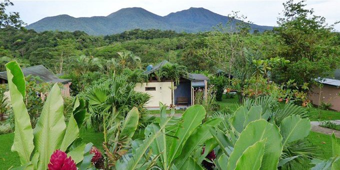 Tenorio Lodge is a charming eco-lodge located near the picturesque town of Bijagua, Costa Rica. Surrounded by the stunning natural beauty of the Tenorio Volcano National Park, the lodge offers comfortable and cozy accommodations with breathtaking views of the surrounding rainforest and mountains. The lodge's rooms and cabins are designed with rustic elegance, incorporating local materials and traditional craftsmanship. Guests can enjoy a variety of outdoor activities, including guided hikes through the national park, birdwatching, and visits to nearby waterfalls and hot springs. The lodge's restaurant serves delicious farm-to-table cuisine, highlighting fresh local ingredients. With its tranquil atmosphere and close proximity to nature, Tenorio Lodge is the perfect retreat for nature lovers and those seeking a peaceful escape in Costa Rica. Lodge amenities include a jacuzzi, restaurant, bar, nature trails, tropical gardens, and internet.