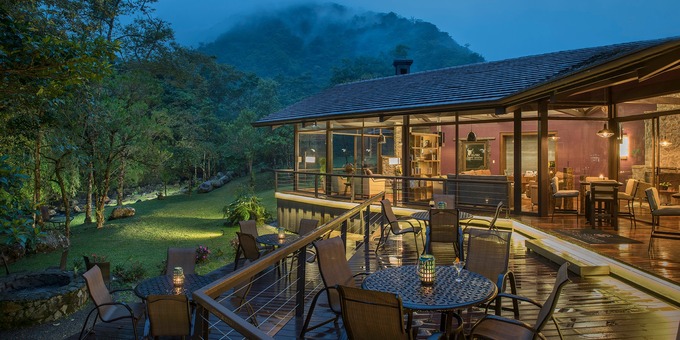 El Silencio Lodge & Spa, nestled in the tranquil surroundings of Bajos del Toro, Costa Rica, is a haven of serenity and natural beauty. This eco-luxury retreat offers a unique escape for those seeking relaxation and connection with nature. The lodge features spacious and beautifully designed private villas and suites, each blending harmoniously with the lush rainforest surroundings. Guests can unwind in their own private hot tubs or lounge on their secluded balconies, enjoying breathtaking views of the cloud forest and waterfalls. The lodge offers a range of wellness experiences, including a luxurious spa that provides rejuvenating treatments inspired by local traditions. Nature enthusiasts will be delighted by the abundance of outdoor activities available, from guided hikes to birdwatching and waterfall rappelling. The on-site organic restaurant serves gourmet cuisine made from fresh, locally sourced ingredients, allowing guests to savor the flavors of Costa Rica. El Silencio Lodge & Spa is a sanctuary for those seeking tranquility, eco-consciousness, and a profound connection with the natural world. The sublime lodge is placed on a 500-acre private reserve within a cloud forest. They feature a full-service spa, organic restaurant, hiking trails, and internet access along with well-appointed and comfortable accommodations. The minimum age requirement for a guest is eight years old.