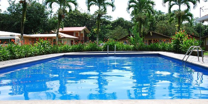 Located two kilometers north of La Fortuna, this budget friendly eco  style hotel is surrounded by lush vegetation and provides a panoramic view of  the Arenal Volcano and its tropical gardens. Hotel amenities include swimming  pool, basketball court, laundry service, view to the volcano, and tropical  gardens bordered by a fresh flowing creek. With the town of La Fortuna just a short drive (or long walk) from the  hotel, Hotel Eco Arenal has made it easy to experience the best of the Arenal  area.