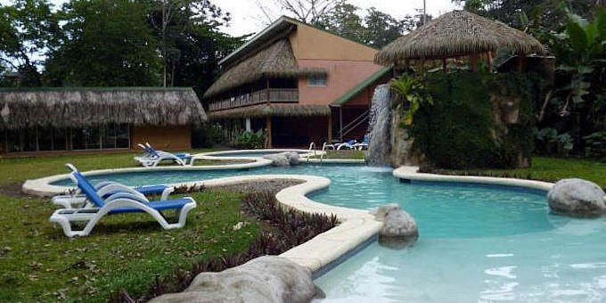 Villas del Caribe in Puerto Viejo, Costa Rica, is a tropical oasis nestled along the stunning Caribbean coastline. This beachfront budget-friendly hotel offers a blend of comfort, relaxation, and natural beauty. Guests can unwind in spacious and well-appointed villas with modern amenities and balconies or patios. Immerse yourself in the tranquility of the lush gardens, take a refreshing dip in the pool, or stroll along the sandy beaches just steps away. Indulge in delicious cuisine at the on-site restaurant, serving a fusion of local and international flavors. With its warm hospitality, convenient location, and easy access to nearby attractions, Villas del Caribe provides an ideal retreat for those seeking a memorable beach getaway in Costa Rica. Hotel amenities include seaside restaurant, landscaped gardens, availability of surf boards, kayaks, boogie boards, and a variety of tours.