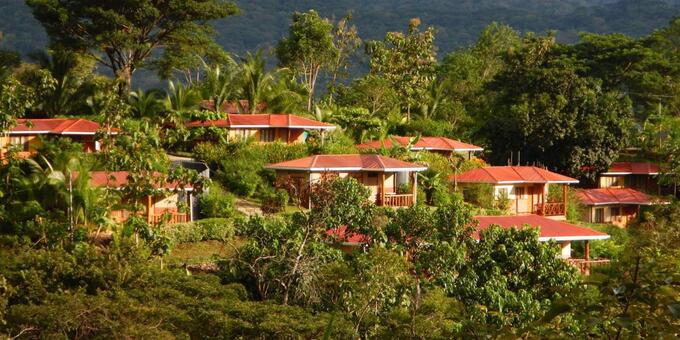 The spacious grounds at the environmentally friendly Hotel Cerro Lodge feature single rooms and individual bungalows carefully positioned along a hillside with rainforest valley and garden views plus gorgeous sunsets. The lodge offers excellent birdwatching opportunities due to its close proximity to the Carara National Park noted for an abundance of tropical birds including the endangered Scarlet Macaw. A network of wide pathways connects the bungalows to the open air restaurant serving breakfast, lunch, and dinner. Breakfast is included. Internet can be found only in the restaurant area. The lodge offers a swimming pool and a hiking trail to the Tarcoles River. Laundry service is available. Ideally located inland but near the central Pacific coastal beaches, and one of Costa Rica’s two international airports, the lodge presents an excellent first or last hotel experience when visiting Costa Rica.