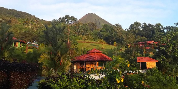 Green Lagoon Falls Park Lodge in La Fortuna, Costa Rica, is a budget-friendly lodge nestled in a serene natural setting, offering a peaceful and affordable stay for travelers. The lodge features comfortable and cozy rooms, equipped with the necessary amenities for a pleasant stay. Guests can enjoy the lush tropical gardens and unwind by the outdoor swimming pool, providing a refreshing escape from the heat. The lodge's location offers easy access to the nearby La Fortuna Waterfall and the Arenal Volcano National Park, allowing guests to explore the region's natural wonders. The friendly staff are available to assist with any inquiries and can provide recommendations for local attractions. Green Lagoon Falls Park Lodge is an excellent choice for budget-conscious travelers seeking comfortable accommodations and a convenient location in La Fortuna. Lodge amenities include a bar, restaurant, spa, Jacuzzi, and small conference rooms.