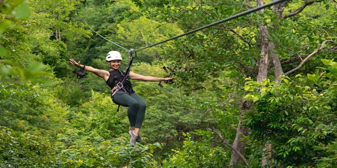 Rio Perdido in Costa Rica stands out among zipline tours with its innovative Canyon Adventure, featuring carbon fiber cables that ensure a noise-free experience in the stunning Rio Blanco canyon. This thrilling adventure includes 15 platforms, a Pendulum Cable, a Tarzan Swing, a Challenge Bridge, Via Ferratas, and 5 ziplines of varying lengths. Guests can take a refreshing break at the Water Station in the middle of the circuit. The Canyon Adventure at Rio Perdido offers an unforgettable ziplining experience, combining adrenaline-pumping thrills with the breathtaking beauty of Costa Rica's natural surroundings.