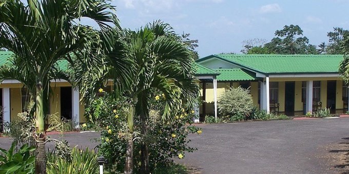 Sueno Dorado Hotel in La Fortuna, Costa Rica, is a budget-friendly hotel that offers comfortable accommodations at affordable rates. The hotel features cozy and well-appointed rooms with essential amenities to ensure a pleasant stay for guests. The friendly staff at Sueno Dorado Hotel are dedicated to providing excellent service and are available to assist with any needs or inquiries. The hotel's convenient location provides easy access to local attractions and activities in La Fortuna, including the Arenal Volcano and hot springs. Guests can relax and unwind in the hotel's communal areas or take a refreshing dip in the outdoor swimming pool. For travelers seeking affordable accommodations in La Fortuna, Sueno Dorado Hotel offers a comfortable and budget-friendly option without compromising on quality or service. Amenities of Sueno Dorado Hotel include restaurant, snack station, swimming pool, hot springs pool, tropical gardens, parking and WiFi internet.