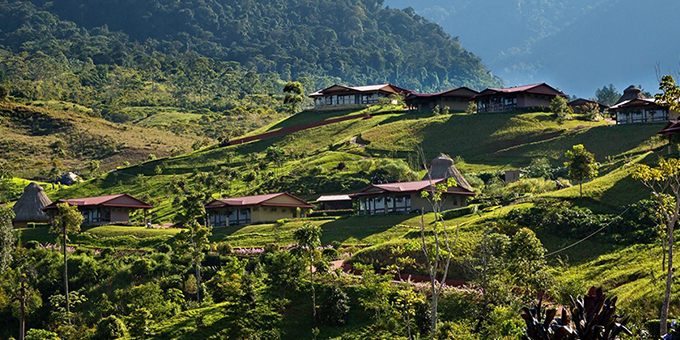 Luxury awaits at Hacienda AltaGracia Auberge Resort located in the mountains of San Isidro providing everything you could wish for in a high-end mountain retreat. Spectacular views from the 865-acre property overlook the beautiful Valle del General below. Guests seeking a secluded vacation retreat can indulge in many ultra-sensory encounters. Relish world-class dining in a variety of intimate settings such as a table for two outdoors, in the wine cellar or within your own private suite. Experience an outdoor massage or one of many pampering spa therapies. Stretch your body saluting the sun in daily complimentary yoga classes. Feed the horses, enjoy guided hikes or take bicycle jaunts to discover the many facets of an authentic hacienda. Tour the gardens with the chef to pick out the daily special’s fresh ingredients. These exceptional moments included in your stay are scheduled throughout the week. The Hacienda features both indoor and outdoor pools with poolside bar as well as a Jacuzzi, fitness center, game room, and outdoor fire pit overlooking scenic vistas. Room choices include 1,100 square foot suites or 2,200 square foot casitas. Whether seeking a romantic getaway or a place where large casitas furnished in stylish comfortable furniture can make your family feel at home, you’ll find both at the beautiful Hacienda AltaGracia Auberge Resort with an attentive and welcoming staff.