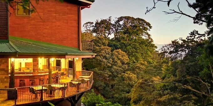 Koora Monteverde Boutique Hotel in Monteverde, Costa Rica, is a tranquil and sustainable retreat where guests can immerse themselves in nature. The beautifully designed rooms and suites offer stunning views of the cloud forest or gardens, while the hotel's commitment to sustainability is reflected in its eco-friendly practices. Guests can explore the wonders of Monteverde through guided hikes, bird-watching tours, and thrilling zipline adventures. Afterward, they can relax in the cozy lounge or unwind in the outdoor hot tub. With a focus on personalized service and environmental consciousness, Koora Monteverde Boutique Hotel provides a memorable and eco-conscious experience in the breathtaking landscapes of Monteverde. Lodge amenities include a private reserve and trails, a restaurant and bar, tropical gardens, air conditioning, heated pools, and free WiFi access in designated areas.