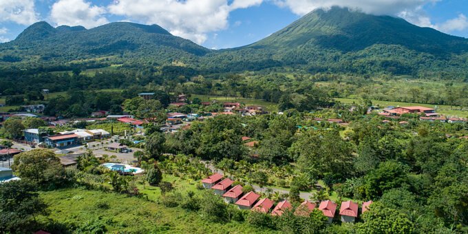 Arenal History Inn in La Fortuna, Costa Rica, is a charming little hotel that offers a unique blend of affordability, comfort, and cultural immersion. The inn takes pride in showcasing the rich history and cultural heritage of the Arenal region. The rooms are tastefully designed with local artwork and furnishings, creating a warm and inviting atmosphere. Guests can enjoy modern amenities such as air conditioning, private bathrooms, and free Wi-Fi. The inn's on-site restaurant serves delicious traditional Costa Rican cuisine, allowing guests to savor the flavors of the region. With its authentic ambiance and dedication to preserving local heritage, Arenal History Inn provides a memorable and immersive experience for guests visiting La Fortuna, Costa Rica. Hotel amenities include a restaurant and bar, swimming pool, tropical gardens, private parking, and WiFi internet.