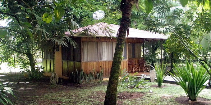 Turtle Beach Lodge is a rustic eco-lodge located between the famous Tortuguero Canals and the pristine beaches of Tortuguero, Costa Rica. Surrounded by lush rainforest and bordered by the Caribbean Sea, the lodge offers a unique and immersive experience in this remote coastal paradise. The lodge's rustic yet comfortable bungalows are nestled among the tropical gardens, providing a peaceful retreat for guests. Each bungalow is designed with locally sourced materials and offers modern amenities to ensure a comfortable stay. The lodge's open-air restaurant serves delicious meals made with fresh, locally sourced ingredients, offering a taste of Costa Rican cuisine. Guests can relax by the outdoor pool or take a leisurely stroll along the expansive beach. The lodge offers a variety of guided tours and activities, including boat tours through the Tortuguero canals to observe the abundant wildlife, hiking excursions in the rainforest, and kayaking adventures on the calm waters. With its commitment to sustainability and its stunning natural surroundings, Turtle Beach Lodge provides a truly immersive experience in the beauty and biodiversity of Tortuguero. Lodge amenities include a swimming pool, restaurant and bar, and trails. Please note that there is a 15 USD entrance fee to enter Tortuguero National Park. It is not possible to include this in your price as it must be paid in person upon arrival to the area. Please also note that while there is a beach, it is not advised to swim there due to strong riptides.