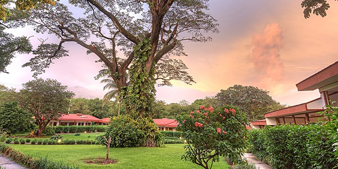 Hacienda Guachipelin Hotel in Rincon de la Vieja, Costa Rica, is a captivating eco-adventure hotel nestled at the base of the majestic Rincon de la Vieja Volcano. With rustic elegance and warm hospitality, this hacienda-style hotel offers a range of thrilling activities, including hiking, horseback riding, zip-lining, and hot springs bathing. Guests can relax in comfortable accommodations and savor farm-to-table cuisine, all while embracing the surrounding natural beauty. With a commitment to sustainability and a wealth of adventures at your doorstep, Hacienda Guachipelin Hotel invites you to immerse yourself in Costa Rica's extraordinary landscapes and create unforgettable memories. Amenities of Hacienda Guachipelin include a swimming pool, yoga deck, bar, hot springs, spa, and restaurant. The lodge also provides WiFi access in some common areas.