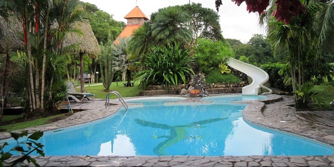 Set in a nature reserve and surrounded by two acres of tropical gardens, the Flying Crocodile Lodge offers ten colorful, individually decorated rooms. This budget-friendly hotel is an excellent value, located at a ten minutes walk from Buena Vista Beach or six kilometers north of Samara town center and beach. Lodge amenities include a swimming pool, kids pool with slide, playground, restaurant, and WiFi in some common areas.
