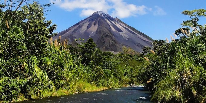 At over 5,400 feet, Arenal Volcano is a behemoth to behold. Considered one of Costa Rica’s most active volcanos, Arenal has given birth to welcoming hot springs, lush jungle carpets and intrigue.
